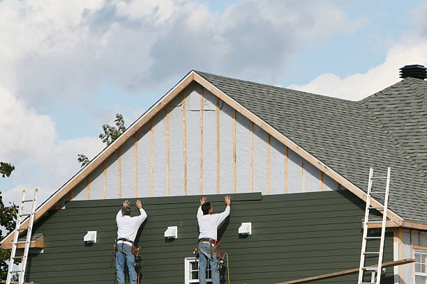 Professional Siding technician working in Northfield, OH